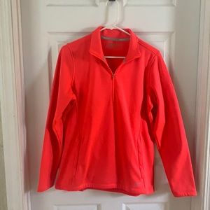 Neon coral Nike pullover.